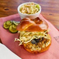 Old School Chopped Pork Sandwich Box · Creamy slaw and red sauce, served with housemade pickles.

Choice of one side.