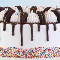 Froyo  Cookies N Cream Cake  · Send a Surprise Cake. 8' Round Cake Serves 10-12.   Cookies n Cream and Vanilla. Ready to go...