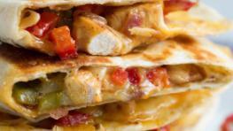 Loaded Quesadillas · Choose your choice of protein chicken or steak. Of course, cheese, onions, cilantro, sour cr...