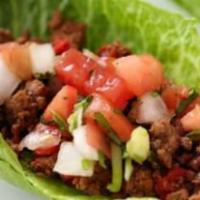 Tacos & Lettuce Wraps · Tacos- corn tortillas. Lettuce wraps- fresh romaine. Choose your choice of protein chicken o...