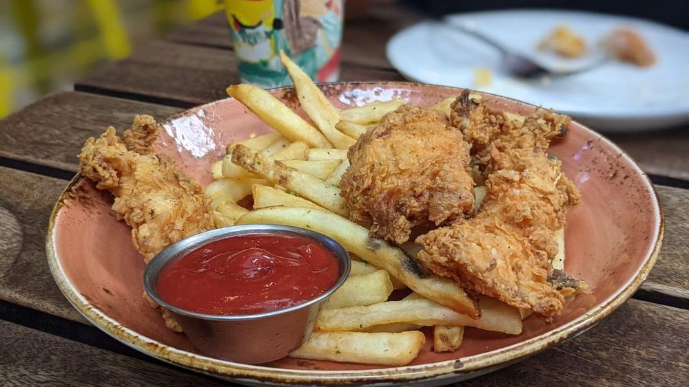 Chicken Tenders · Served with a choice of side and a beverage.