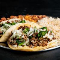 Two Tacos · Carne asada with cheese, lettuce and onions