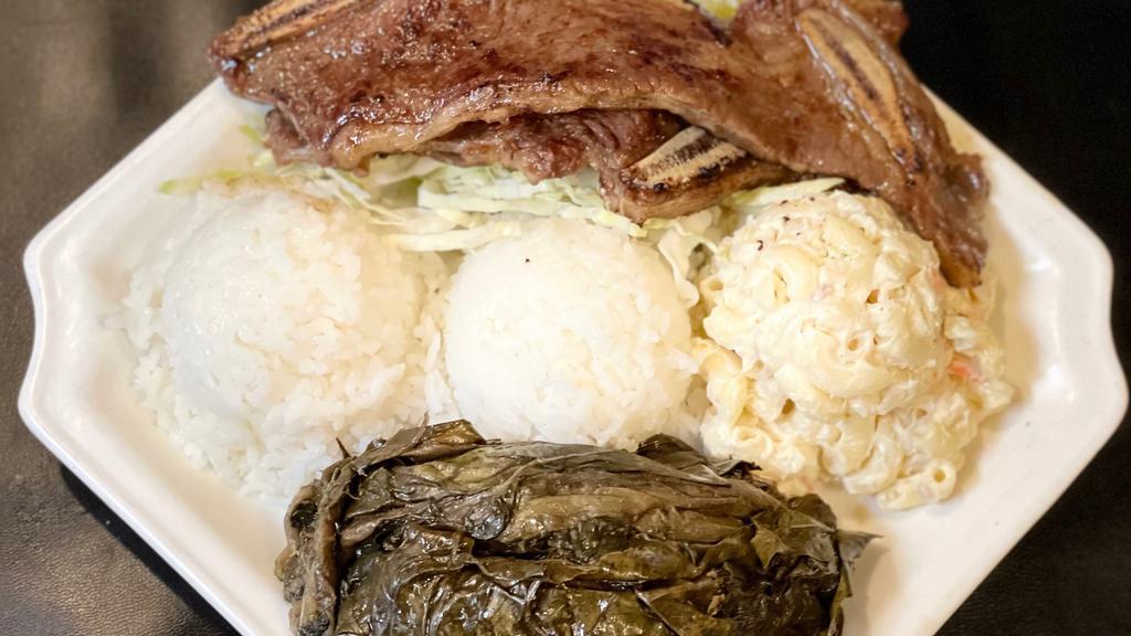 Pork Lau Lau & Bbq Combo · Lau Lau is a native, traditional dish that has chunks of pork and fish all wrapped inside taro leaves, served your choice of BBQ and 2 scoops of rice, 1 scoop of macaroni salad.