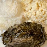 Mini Pork Lau Lau · Authentic Hawaiian entrée made with pork, fish, and taro leaves served with a scoop of rice ...