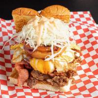 Hungry Boy · Beef patty, bbq beef, bacon, crispy onions, mixed cheese, shredded cabbage, fried egg, speci...