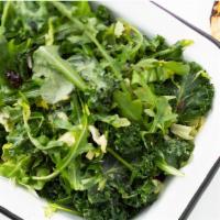 Kale Cabbage Salad · Kale, Nappa cabbage, arugula, cilantro, scallions, slivered almonds, currants tossed in a mu...