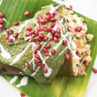 Vegan Chile Relleno · Stuffed with sautéed vegetables, vegan cream cheese & drenched in a poblano. cream sauce, dr...