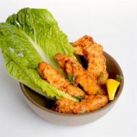Chicken Tenders · buttermilk marinated chicken breast tenders. served with ketchup and ranch