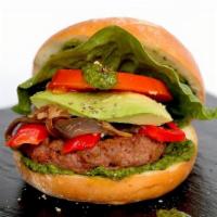 Vegan Burger · impossible patty on a potato bun with arugula pesto, caramelized onion, tomato, romaine, roa...