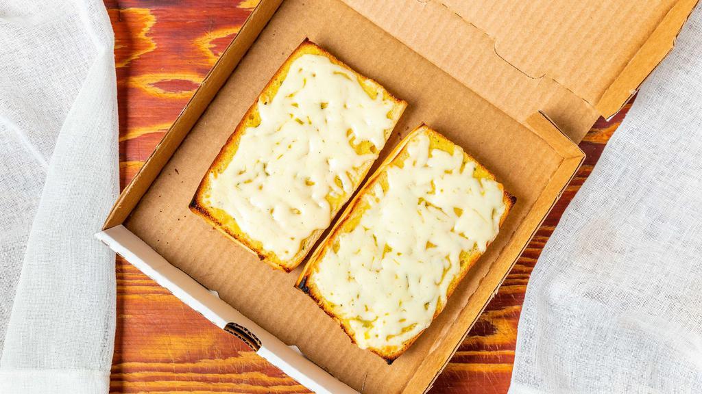 Garlic Cheese Bread · Fresh Baked Bread with our Garlic Spread and Cheese
