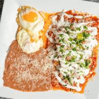 Chipotle Chilaquiles · Crispy tortilla chips made with our delicious chipotle salsa. Served with cilantro, onions, ...