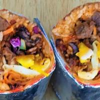 B Bulgogi Burrito  · Vegetables over rice with Bulgogi. Sesame oil, a sunny side up egg, and gochujang plus speci...