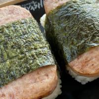 Spam Masubi · Spam, rice, and pork sung wrapped in seaweed with teriyaki sauce