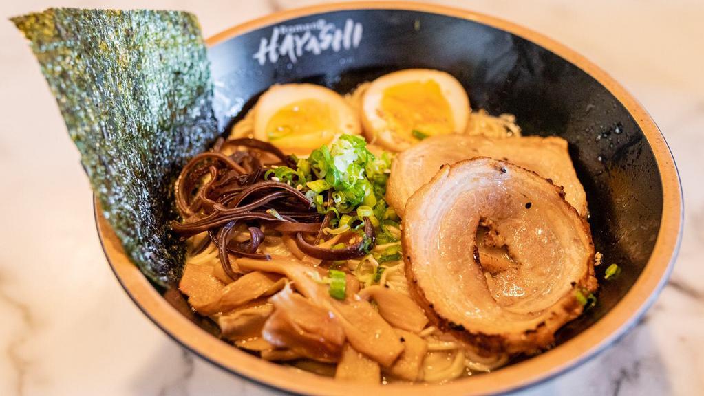 Tonkotsu Ramen · Pork cha-su, bamboo, wood ear mushrooms, soft boiled egg, green onion, and nori (seaweed).(thin noodle)