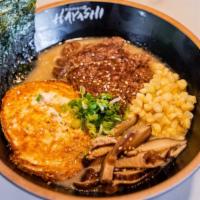 Shoyu Ramen · Grilled steak, pan fried egg, hand cut sweet corn, shitake mushroom, green onion, and nori (...