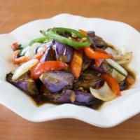Eggplant Delight · Spicy. Sautéed eggplant with garlic, jalapeno, red bell peppers, onion and basil.