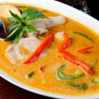 Red Curry · Red curry paste with green beans, eggplant, bamboo shoots, red bell peppers, basil, and coco...