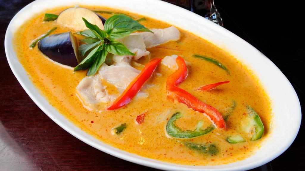 Red Curry · Red curry paste with green beans, eggplant, bamboo shoots, red bell peppers, basil, and coconut milk.