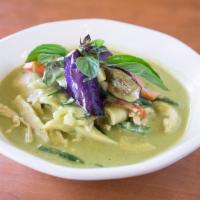 Green Curry · Spicy. Green curry paste with eggplant, red bell peppers, bamboo shoots, green beans, basil,...