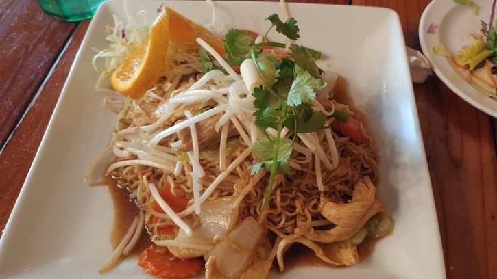 Thai Chow Mein · Thai style pan-fried egg noodles with cabbage, onion, bean sprouts, and carrots in light brown sauce.