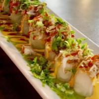 Spicy Crab Roll · Special. Spicy. Tempura shrimp, noodle, carrots, jalapeños lettuce and avocado, topped with ...