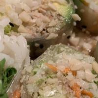 Cali Roll · Lettuce, carrot, crab, noodles, cucumber, avocado, covered with toasted sesame seeds, served...