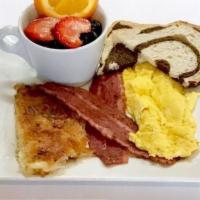 2 Or 3 Egg Breakfast · Scrambled eggs, hash browns or turkey bacon, choice of bread.