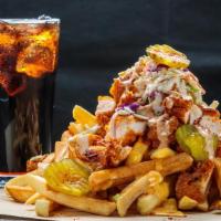 Loaded French Fries Combo · Combo comes with a fountain drink and a side of our special sauce