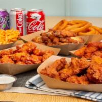 40 Wings Combo · 40 wings your choice of style and flavor, 2 sides, 4 drinks, and 2 dipping sauces.