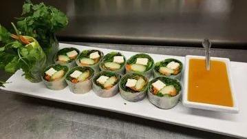 Fresh Roll · Romaine lettuce, organic tofu, carrots, cucumber, cilantro and wrapped in rice paper served with peanut sauce.