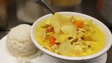 Yellow Curry · Yellow curry paste with coconut milk, potato, onion and carrots.