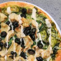Artichoke Pizza (Plant Based) · Freshly Made crust with House made pesto sauce and  plant based  cheese topped with  articho...