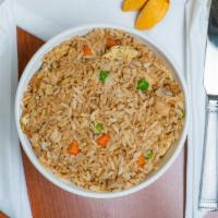 Chicken Fried Rice · Egg fried rice with peas carrots and chicken.