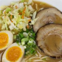 Miso Ramen · Chicken broth and miso broth topped with chashu, mixed vegetables, seasoned egg and green on...