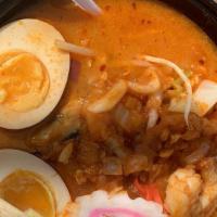 Seafood Ramen · Chicken broth infused with spicy miso with Shrimp, Mussels, Fish Cake Scallops and Calamari....