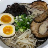 Tonkotsu-Black · Creamy pork broth topped with black garlic oil, chahsu, seasoned egg, wood ear mushrooms, be...