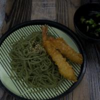 Kale Noodle Tsukemen · Refreshing cold kale noodles topped with shrimp tempura and sesame seeds. Served with a soy ...