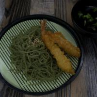 Kale Noodle Tsukemen · Refreshing cold kale noodles topped with shrimp tempura and sesame seeds. Served with a soy ...