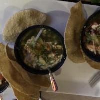 Ceviche Trío · Ceviche de pescado, camarón y pulpo con aguacate, salsa de serrano, crema, aderezo de chipot...