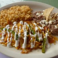 Huevos A La Mexicana · 2 scramble eggs with onions,tomatoe and jalapenos.
served with rice,beans and tortillas.