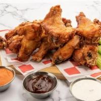 Jumbo Wings (15-Pc Large Pack) · 15 crisp fried golden-brown wings tossed in the sauce of your choice.