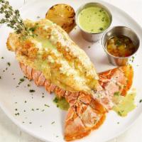 Lobster · Grilled lobster, lemon pistou, and smoked garlic butter.