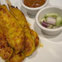 Chicken Satay (5) · Most popular. Contains peanuts and or nuts. Chicken skewers marinated in Thai spices grilled...