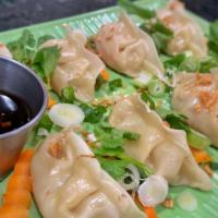 Steamed Dumplings (8 ) · Most popular. Choice of chicken or vegetable dumplings served with soy dipping sauce.