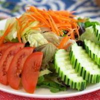 House Salad · Vegetarian. Mixed green salad with cucumber, carrot, tomato, and house dressing.