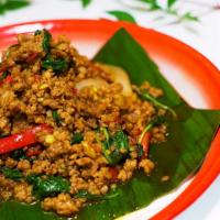 Spicy Basil · Stir-fried aromatic green basil leaves with white onion, garlic, chili and bell peppers. Mos...