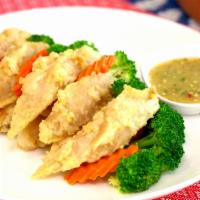 Fried Fish Fillet · Deep fried fish fillet, steamed broccoli and carrots served with Thai spicy sauce