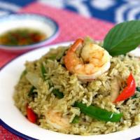Green Curry Fried Rice · Medium spicy by default. Fried rice with green curry paste, white onion, bell peppers, and g...