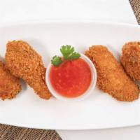 Golden Wings · Golden fried chicken wings served with Thai taste sauce.