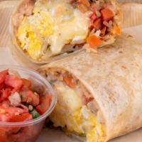 Breakfast Burrito · Scrambled eggs, onions & cilantro, organic rice, organic beans, choice of salsa and mozzarel...